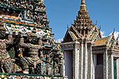 Bangkok Wat Arun - the statues of the mythical  demon bears  that support the different levels of the prang. 